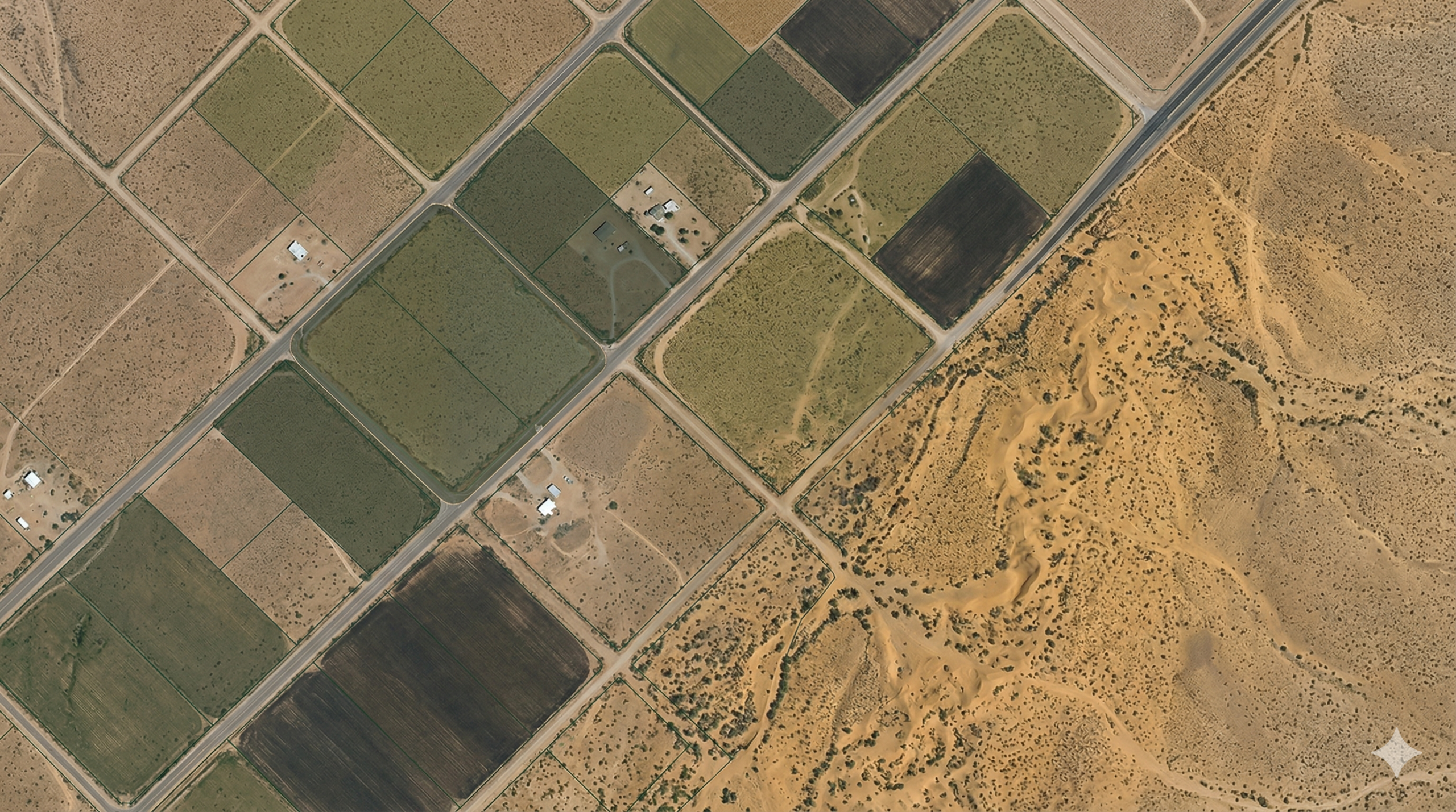 Aerial view of farmland and desert